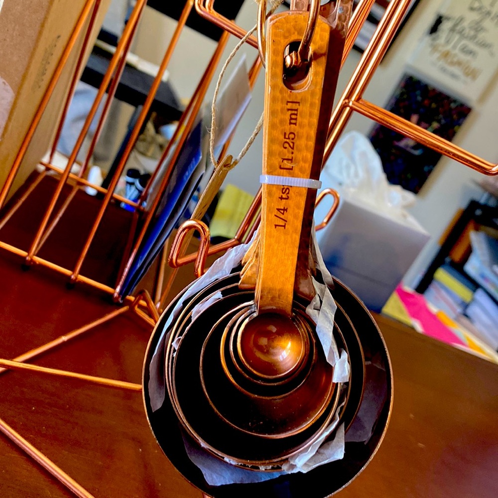 Set of measuring cups & spoons. Copper colored.